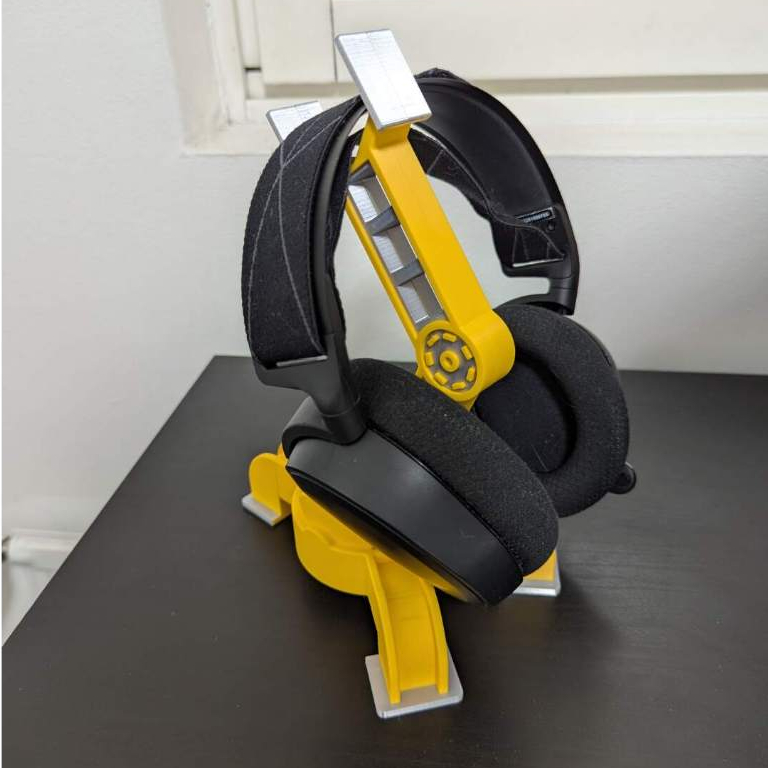 Suporte Gamer Robótico Bicolor para Headset – Display Industrial para Mesa e Setup Moderno