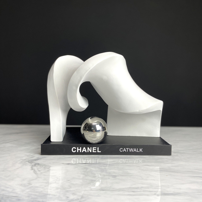 Modern minimalist white, black, and blue geometric twisted irregular ornaments for model homes and sales offices
