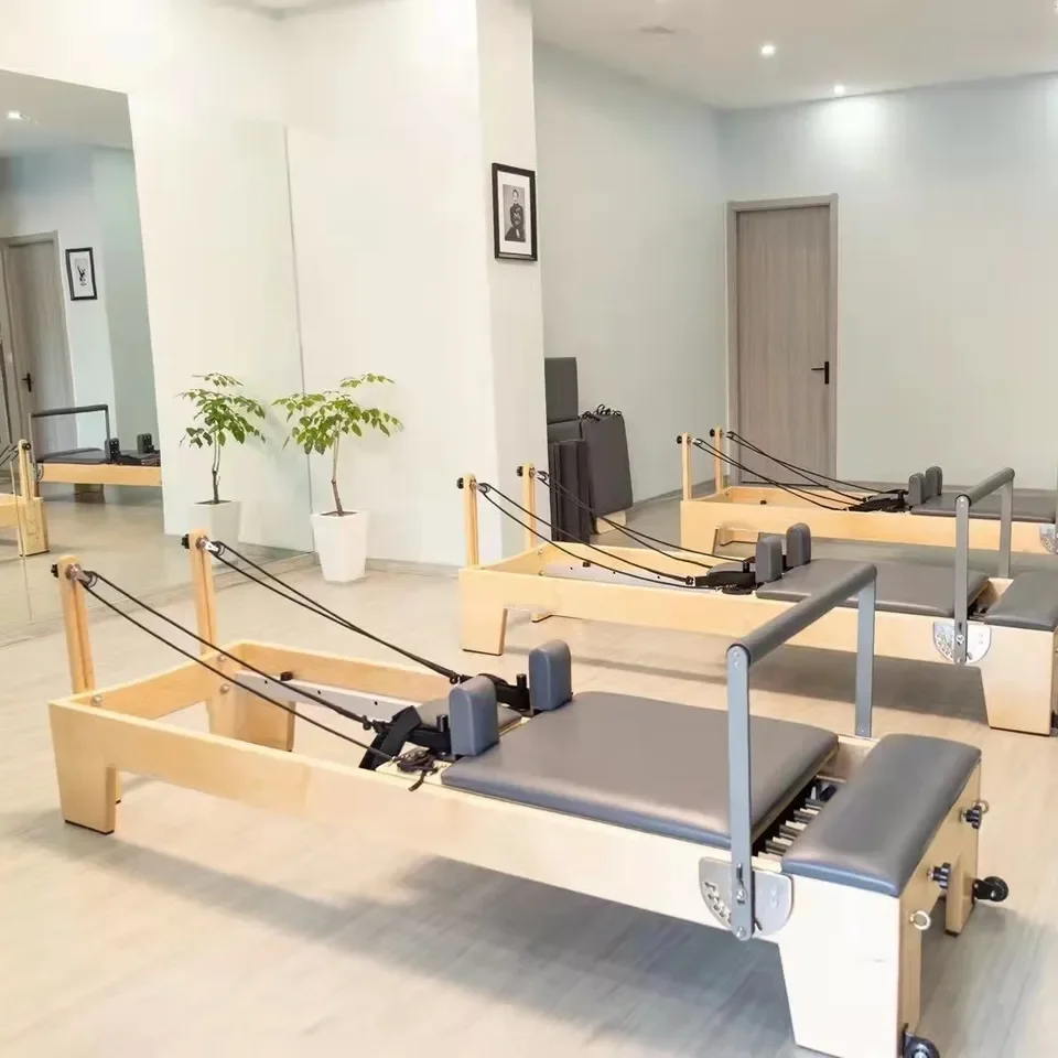 Wholesale Professional Best Pilates Wood Reformer Studio Machine for Home Gym Yoga Core Training Bed