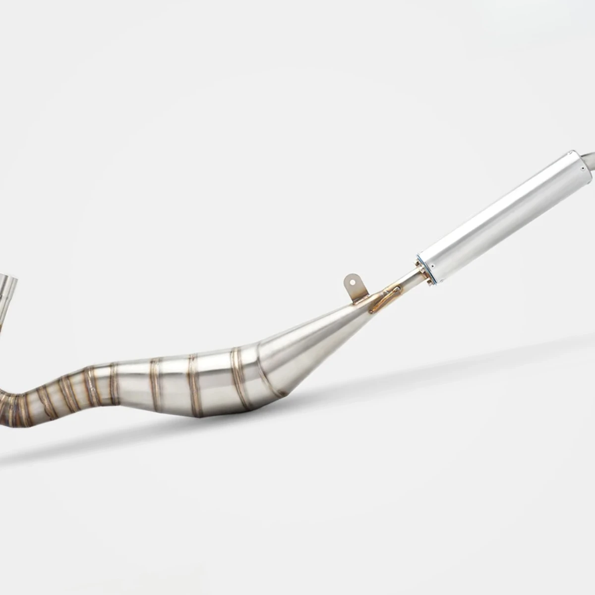 RS stainless steel two-stroke expansion chamber exhaust pipe for Yamaha TZR125 (1987–1992), designed to boost power output.