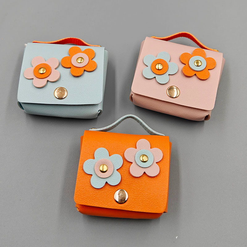 Versão coreana de couro pequena flor moeda bolsa chaveiro pingente moda criativa Bluetooth fone de ouvido saco DIY jóias