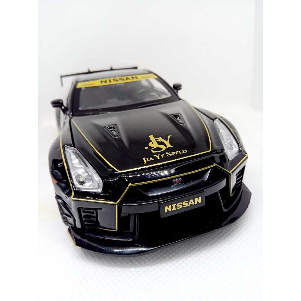 Miniatura Nissan Skyline GTR R35 John Player Especial 1:24 metal Diecast colecionável