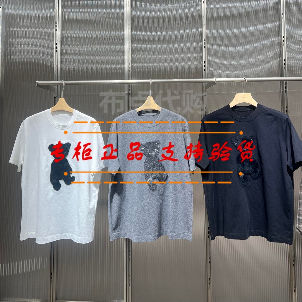 [Cloth Dot JN] Counter Genuine Feminino 2026 Primavera Algodão Urso Solto Camiseta de Manga Curta 5Q2111840/K 595