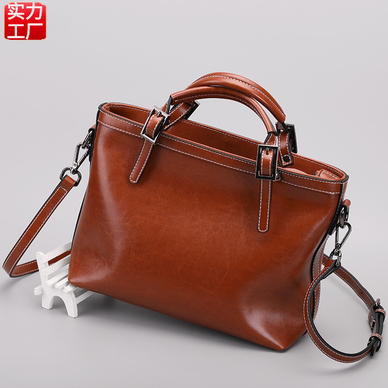 Senhoras sacos 2026 novo estilo de couro genuíno primavera verão bolsa simples Commuter saco de um ombro Diagonal estilo