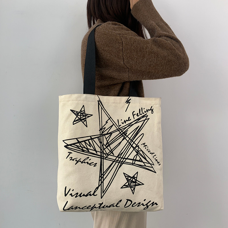 2026 Five-Star Street Hip-Hop Rock Fashion Trend Retro ins Bolsa de lona criativa Bolsa de lona de grande capacidade