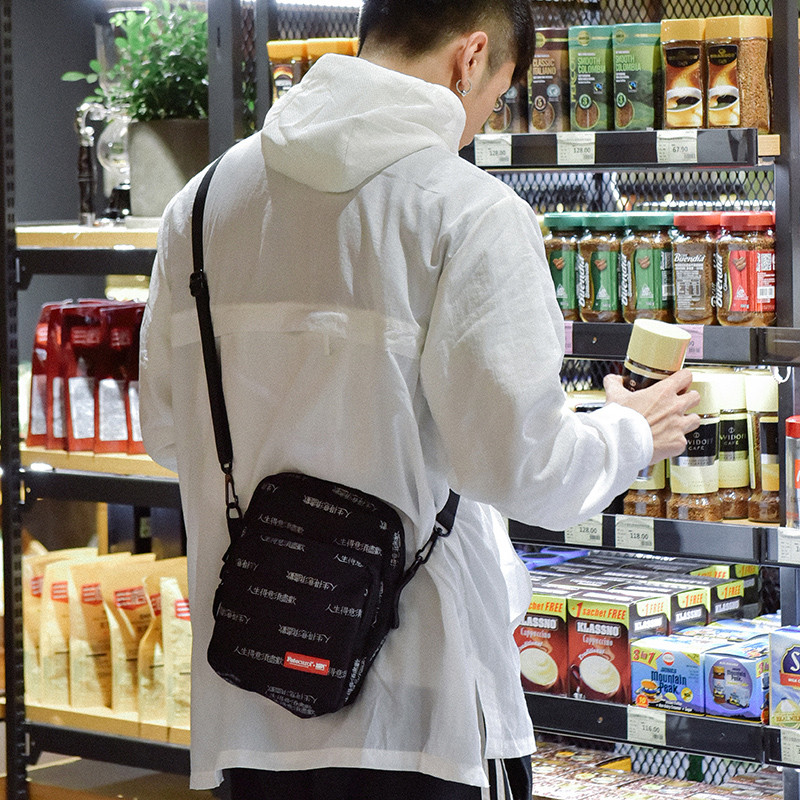 Nacional na moda masculina Casual Vertical ombro pequeno saco de texto exclusivo saco do mensageiro japonês Harajuku na