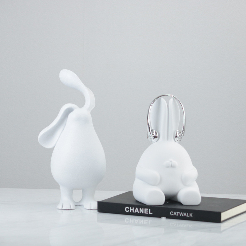 Modern minimalist Nordic cartoon white rabbit with headphones decoration for children's room, bedroom, model home, and s