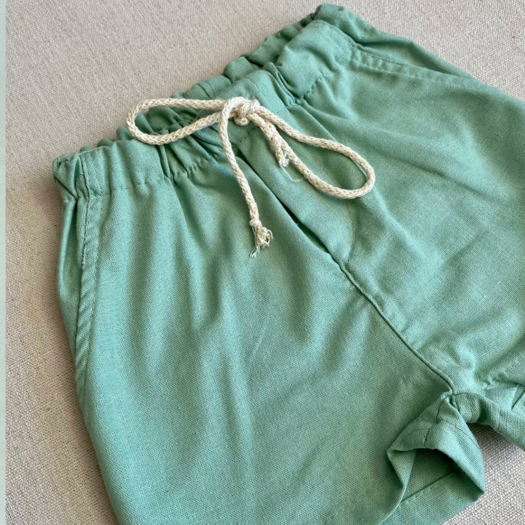 Short Menina Linho Sustentável Verde Menta com Bolsos Franjas Infantil Premium