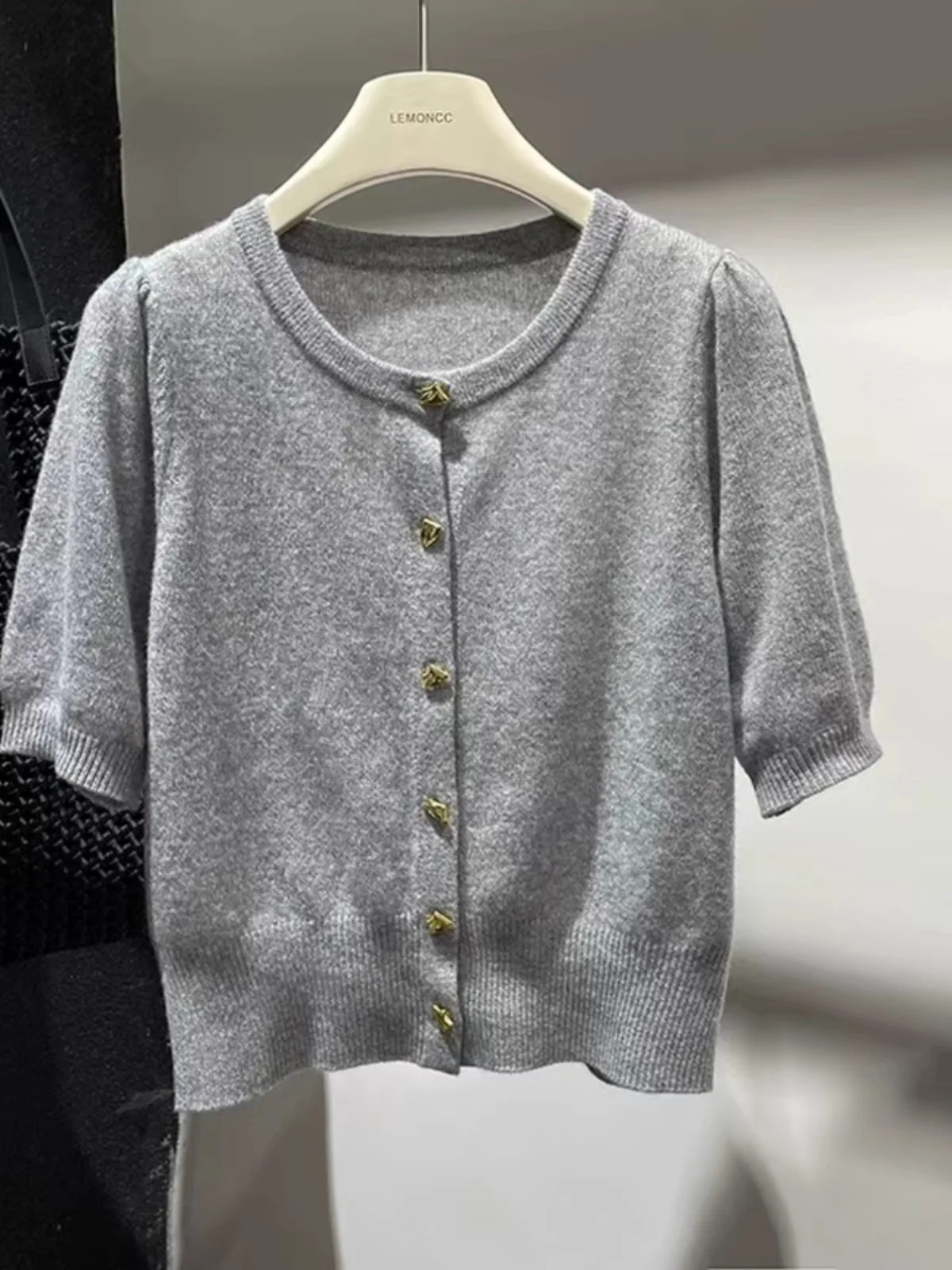 European station spring summer new top women's 100 wool knitted cardigan short-sleeved round neck design sense cashmere sweater