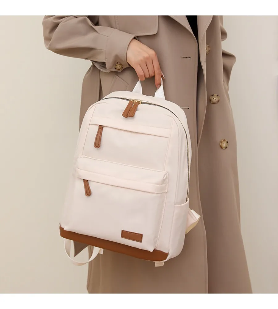 Sturdy oxford cloth backpack with a timeless design ideal for commuters who value durability and everyday practicality
