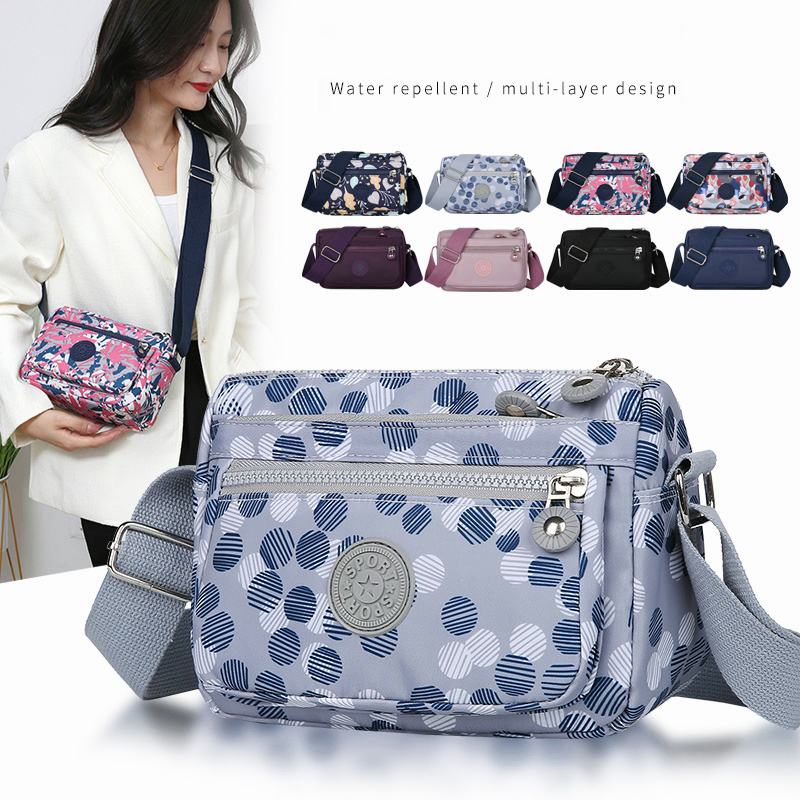 Bolsa transversal feminina de nylon à prova d'água, multi-camadas com zíper, grande capacidade, ideal para viagens ao