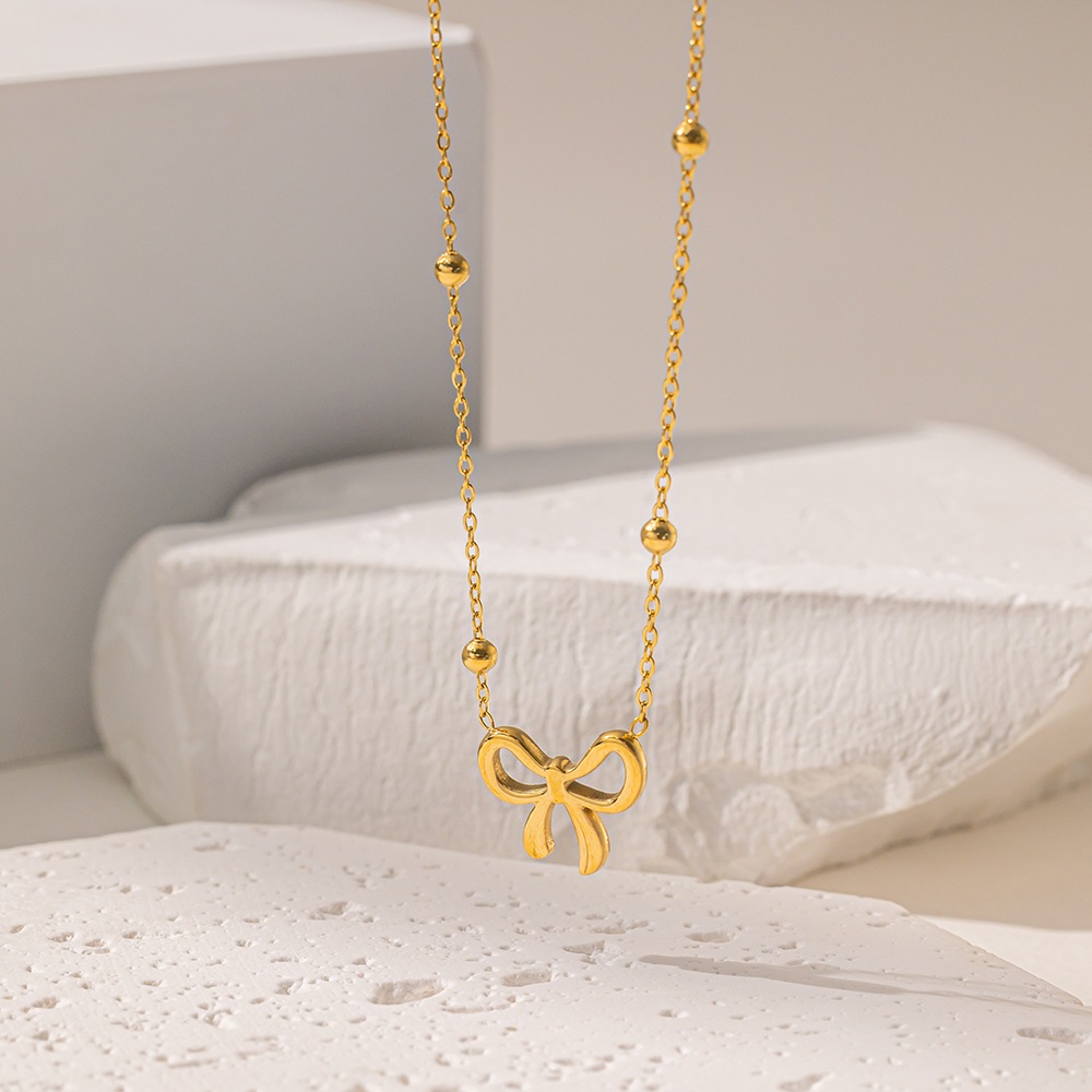 Creative Bow Pendant Silver Necklace for Women – Modern Elegant and Versatile Clavicle Chain
