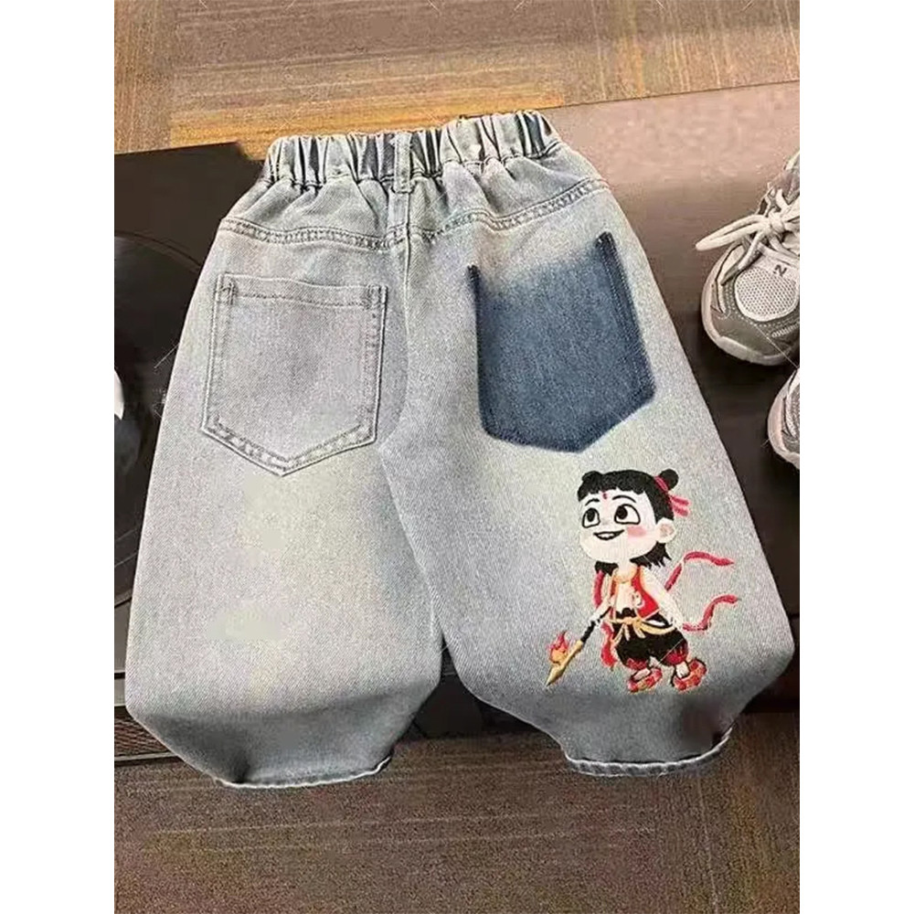 Crianças roupas infantis meninos Nezha Jeans 2026 novo estilo dos desenhos animados calças esportivas médio grande crian