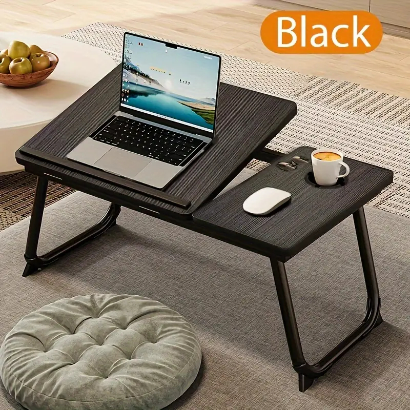 A mesa do computador é fácil de transportar e pode ser ajustada em cinco níveis Ele vem com um mouse pad e é multifunci