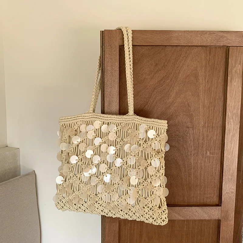 Niche light luxury spring and summer shoulder woven bags, large-capacity women's bags, hollowed-out hand-crocheted bags