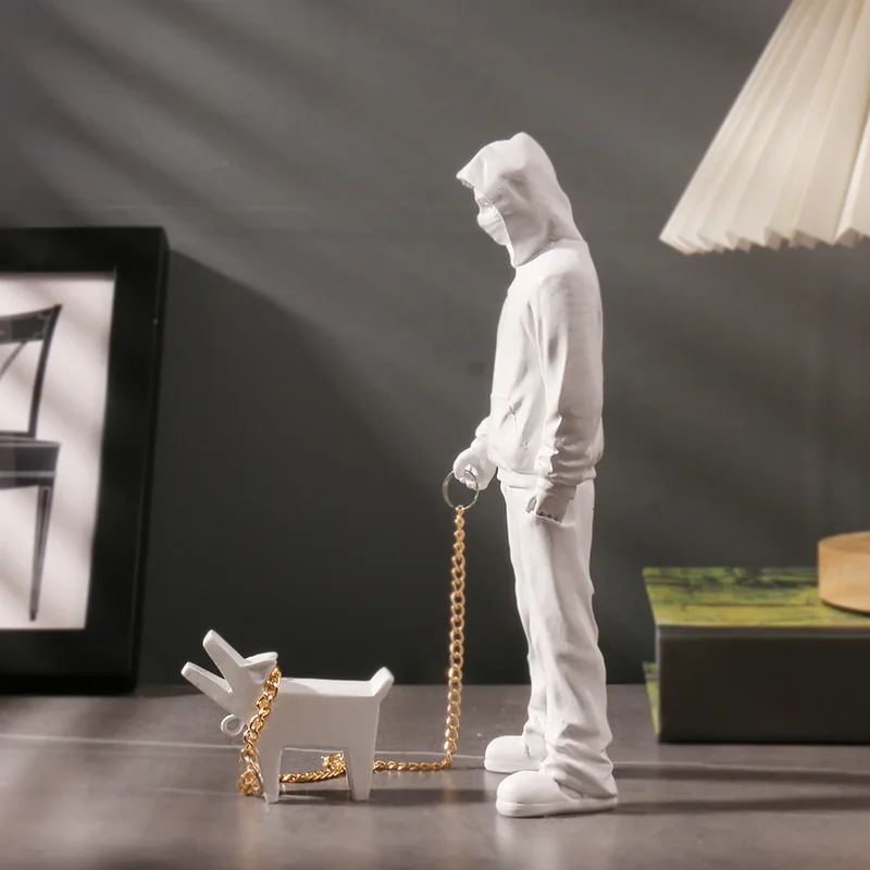 Creative Banksy Is A Fashionable Man Who Plays with Dogs, White Fashionable Toys, Art Sculptures, and Decorations