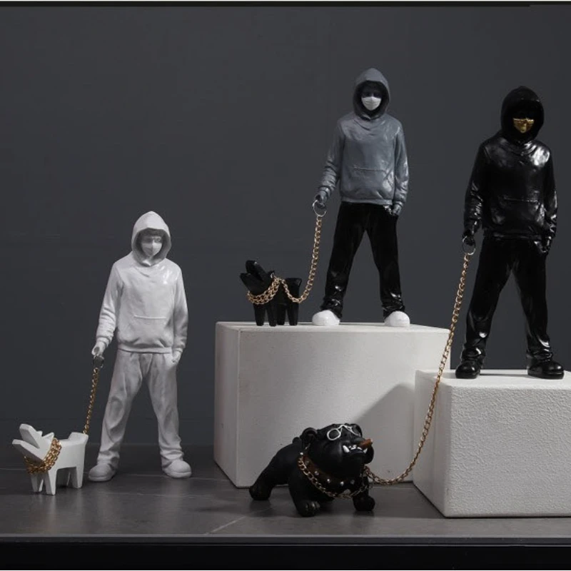 Creative Banksy Is A Fashionable Man Who Plays with Dogs, White Fashionable Toys, Art Sculptures, and Decorations
