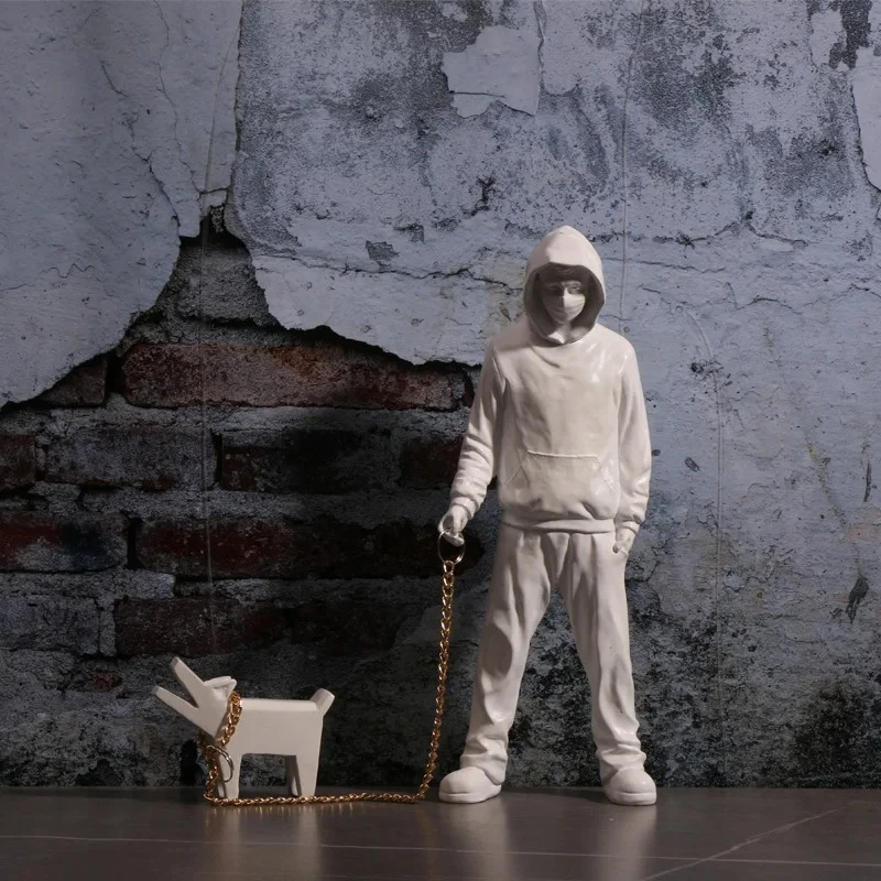 Creative Banksy Is A Fashionable Man Who Plays with Dogs, White Fashionable Toys, Art Sculptures, and Decorations