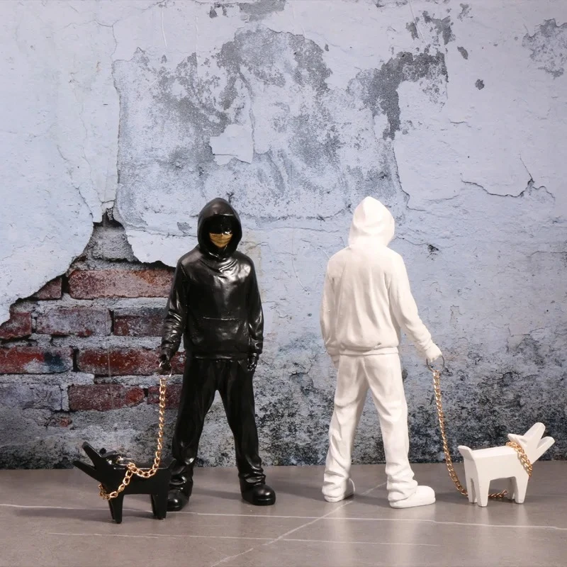 Creative Banksy Is A Fashionable Man Who Plays with Dogs, White Fashionable Toys, Art Sculptures, and Decorations