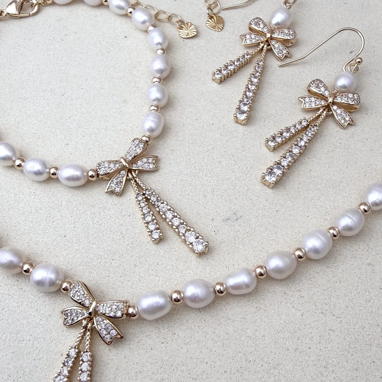 Natural Rice-Shaped Pearl Bowknot Necklace Bracelet Earrings Set Light Luxury Minimalist High-End Temperament Versatile Jewelry