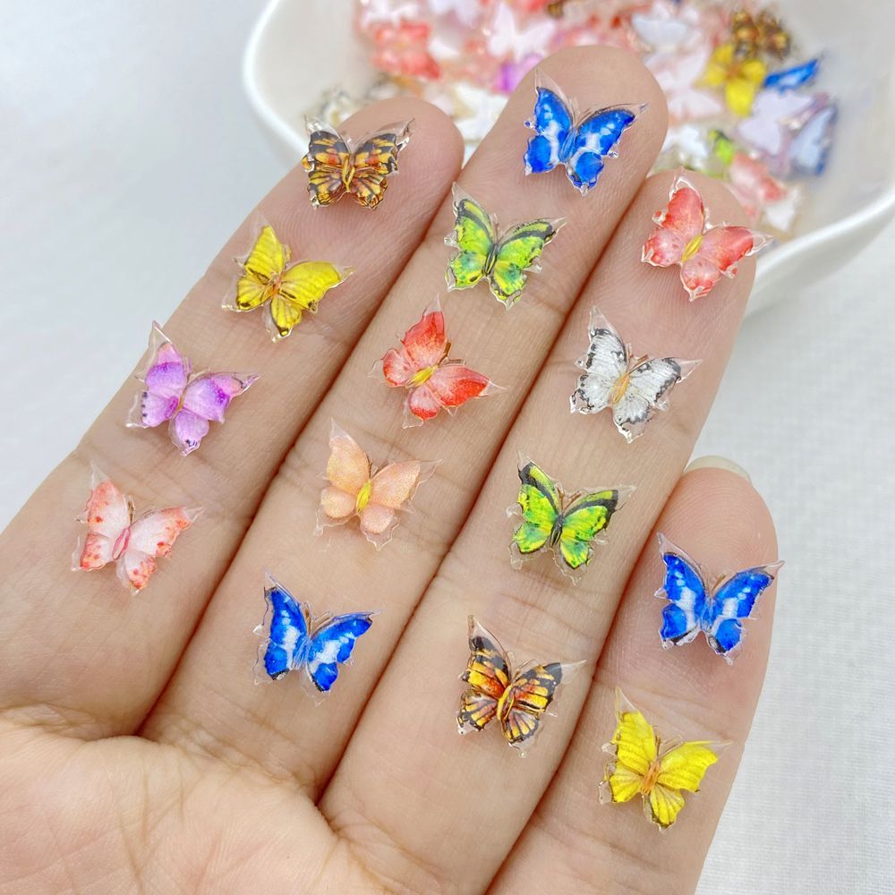 Venda a Quente Manicure Decorações de Manicure Mini Borboleta Colorida 3D Tamanho Pequeno Multicolor DIY 50 Peças