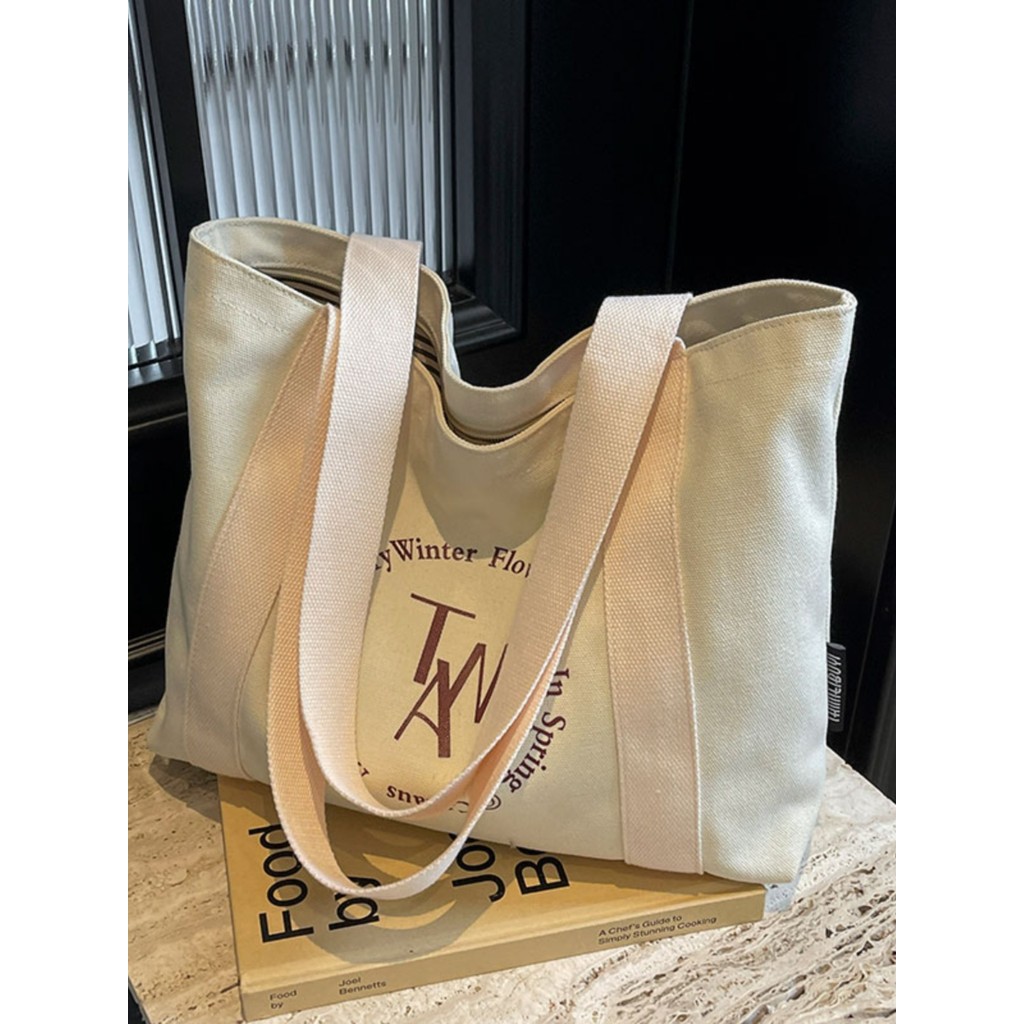 Bolsa de lona feminina 2026 novo estilo portátil de grande capacidade estudantes universitários classe Commuter High-End