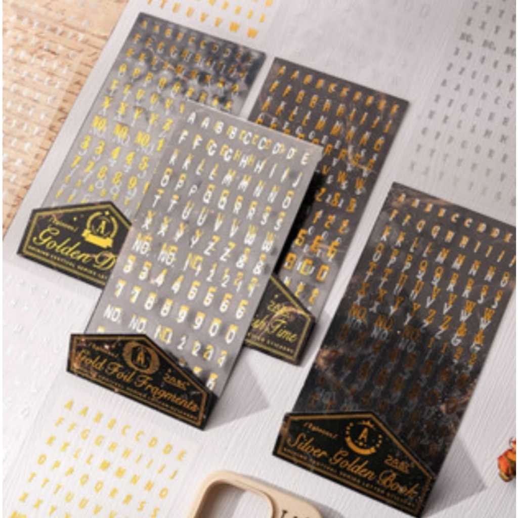 CARTELA ALFABÉTICA DE ADESIVOS PETS DOURADO/PRATA COM FOIL 2 CARTELAS
