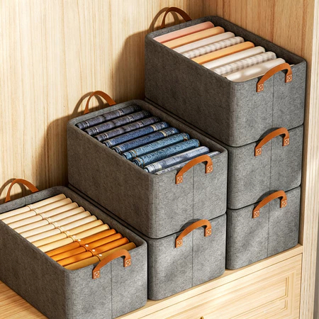 Set of 4 clothes organizers, fabric basket with steel frame for t-shirts and pants in the wardrobe.