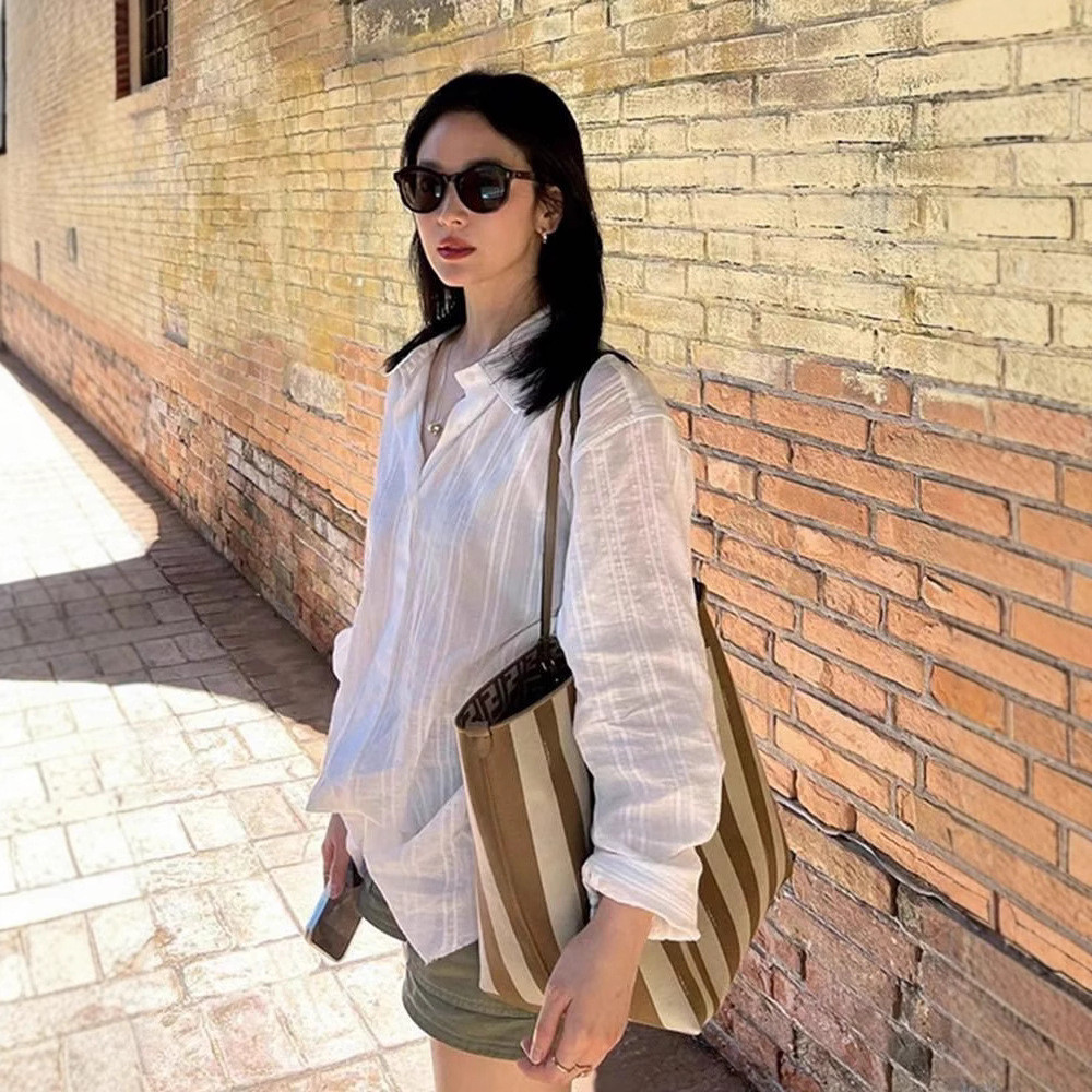 White women's summer sun protection shirt2025New long-sleeved thin textured mid-length shirt