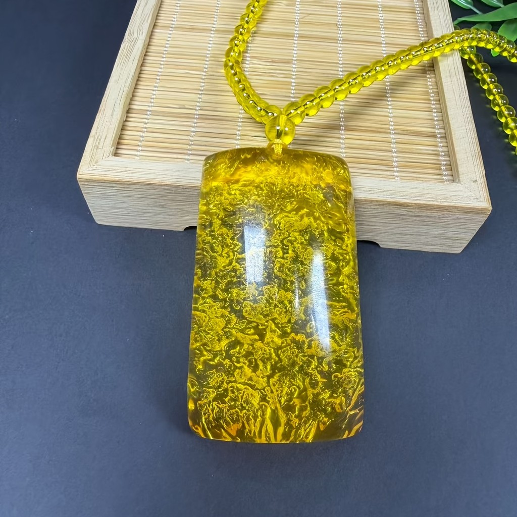 Pingente de marca Wuwu âmbar Natural, textura fosca leva elegante e moderna escolha elegante para ambos os homens e mulh
