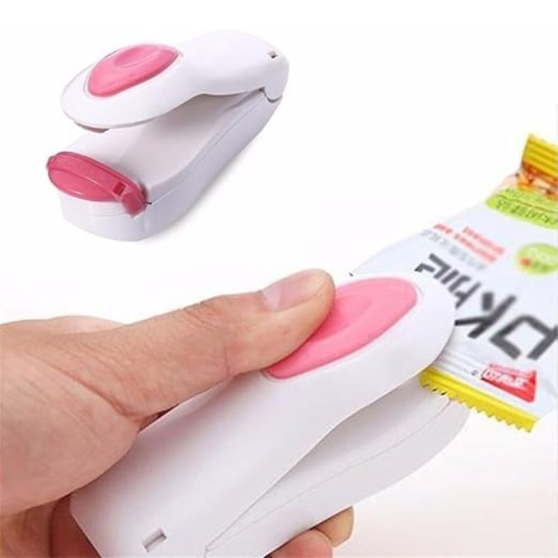 Mini Seladora para Plástico Lacra Embalagem Manual Portátil á Pilha Conserva Alimentos