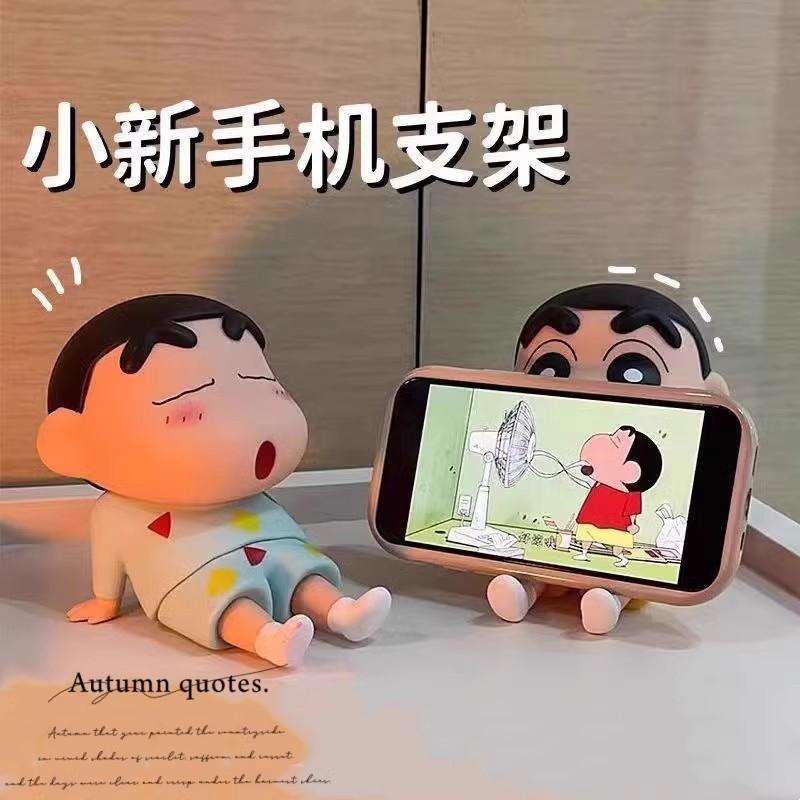 Novo bonito Shin-Chan suporte do telefone móvel preguiçoso perseguindo Drama ferramenta útil criativo dos desenhos anima
