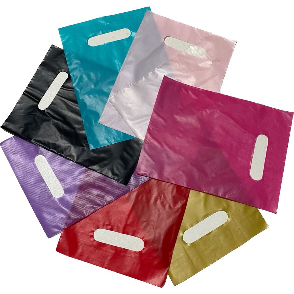 25 Sacolas Plásticas - 16x20 -Material Virgem -alça Vazada Boca De Palhaço Para Loja - 0,10 Micras