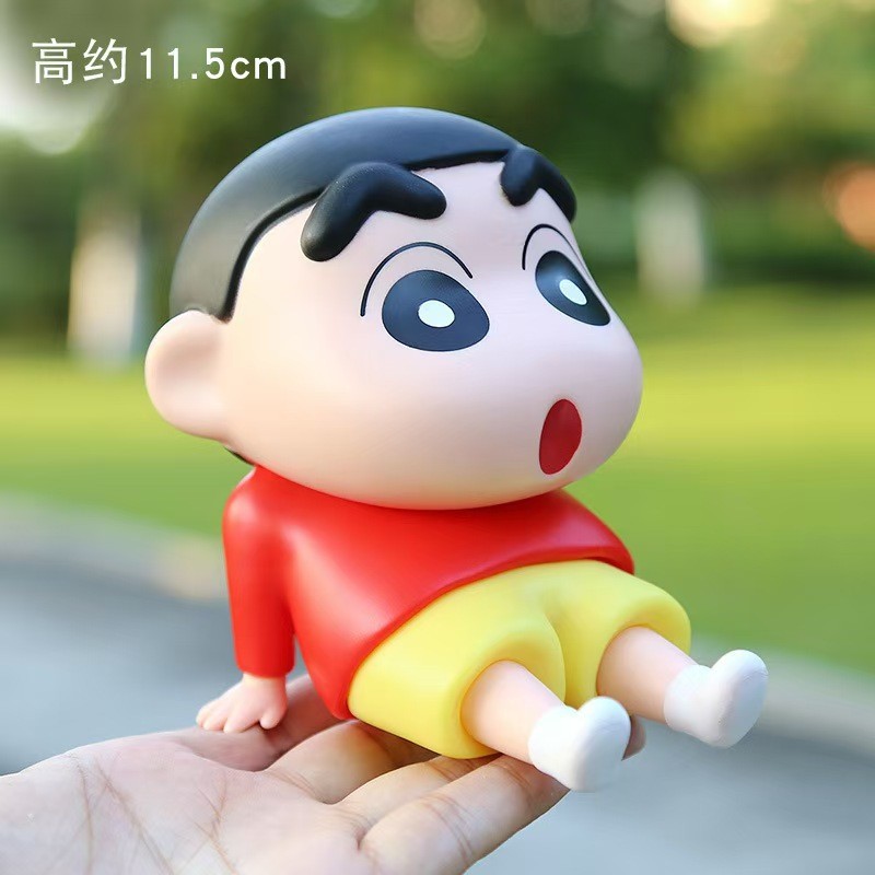 Novo suporte do telefone móvel Crayon Shin-Chan criativo Anime modelo preguiçoso Desktop na moda jogar bonito mão escrit