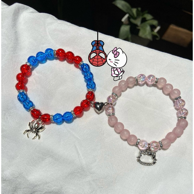 Pulseira homem aranha e Hello Kitty com ímã magnético