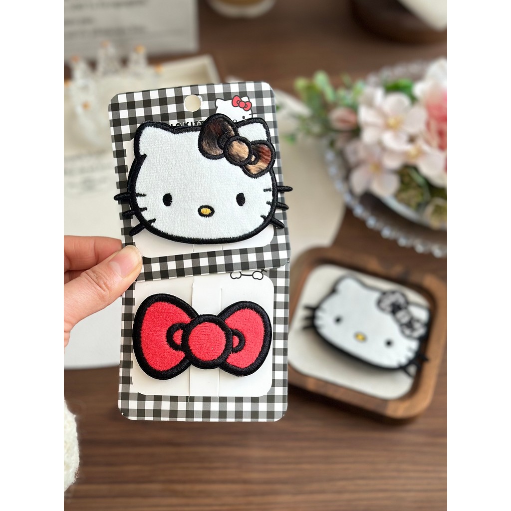 Genuíno Hello Kitty Leopard Print Hello Kitty Bordado BB Clip Bowknot Girl Cute Bangs Side Clip Grampo de cabelo