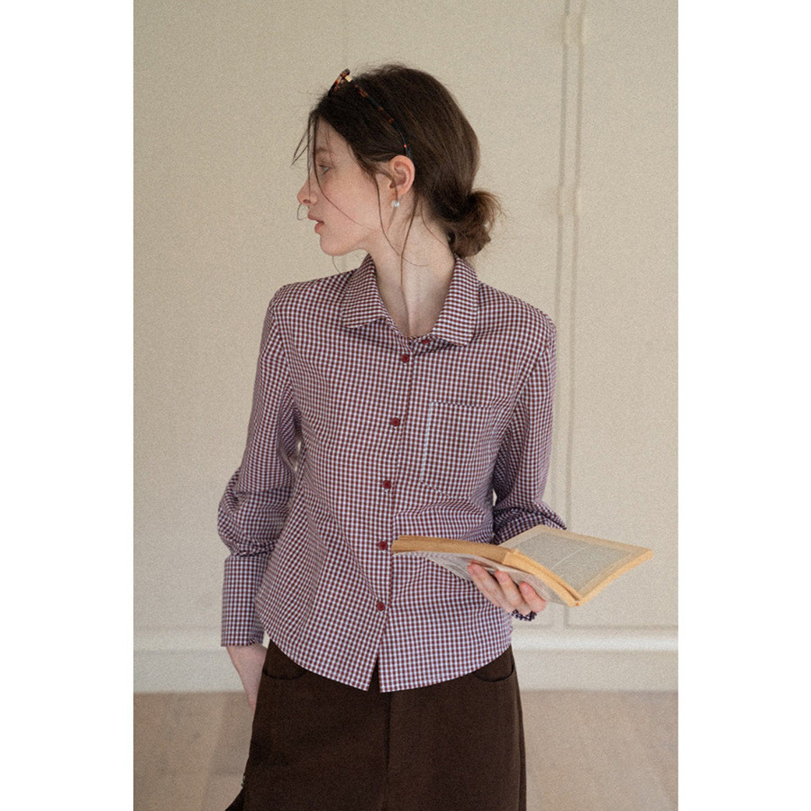 Collared, sophisticated retro plaid long-sleeve shirt layered over a casual commuter crop top