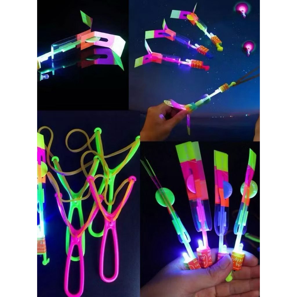 Brinquedo Lançador com Luz Colorida que Voa Alto Com Estilingue Helicóptero Voador LED c/ Estilingue Girocóptero Foguete