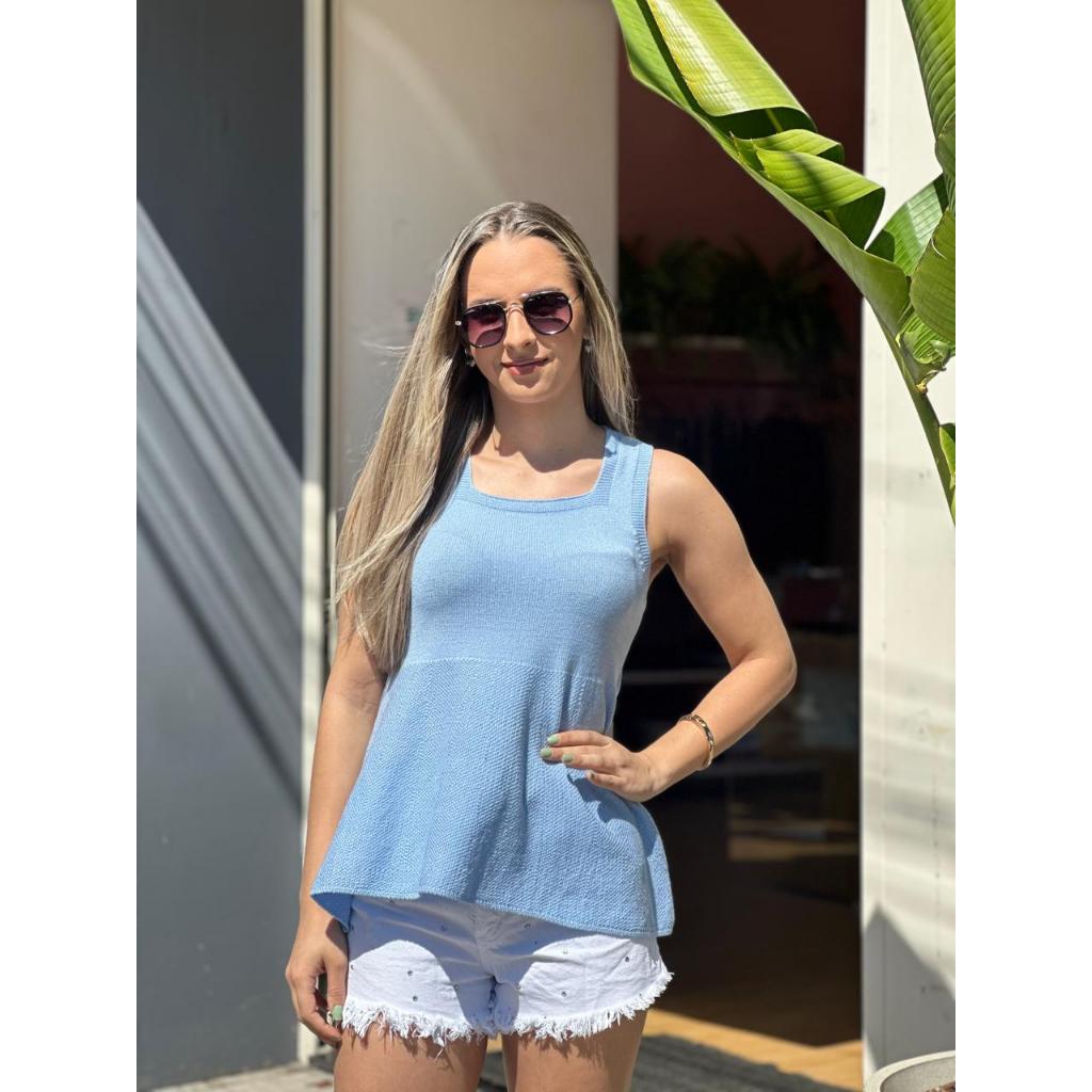 BLUSA PEPLUM MODAL ,DELICADA ,ELEGANTE E  EXTREMAMENTE CONFORTAVEL.O MODELO POSSUI CAIMENTO FLUIDO E TOQUE MACIO.