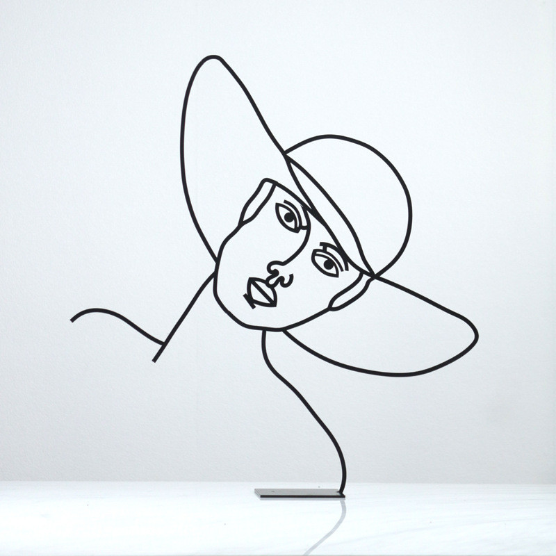 IKOJ Nordic minimalist handcrafted geometric abstract sculpture of a woman, a decorative piece for display in model home