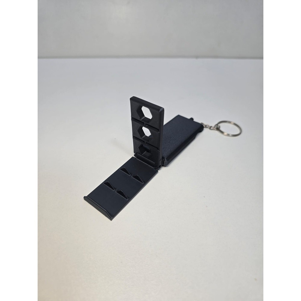 SUPORTE DOBRÁVEL DE CELULAR PORTÁTIL COM CHAVEIRO NA IMPRESSÃO 3D – COMPACTO, AJUSTÁVEL E IDEAL PARA VIAGEM E MESA