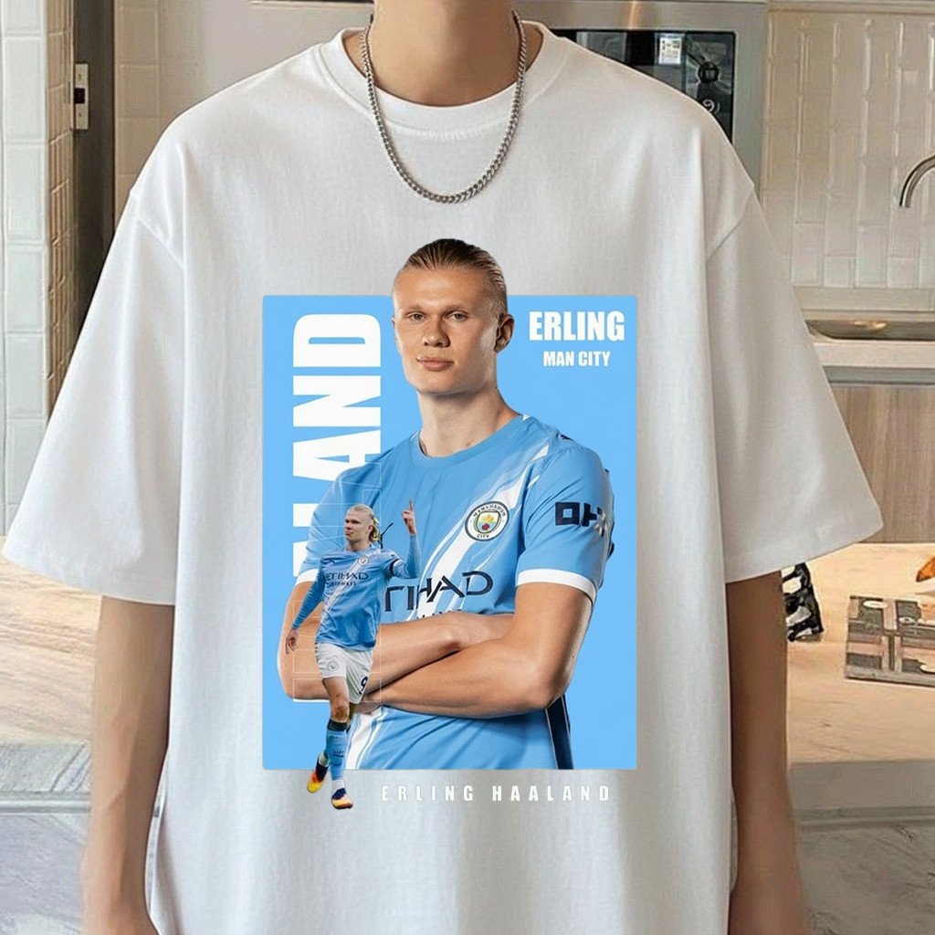 Harland football star T-shirt with Manchester City text elements, short-sleeved cotton.