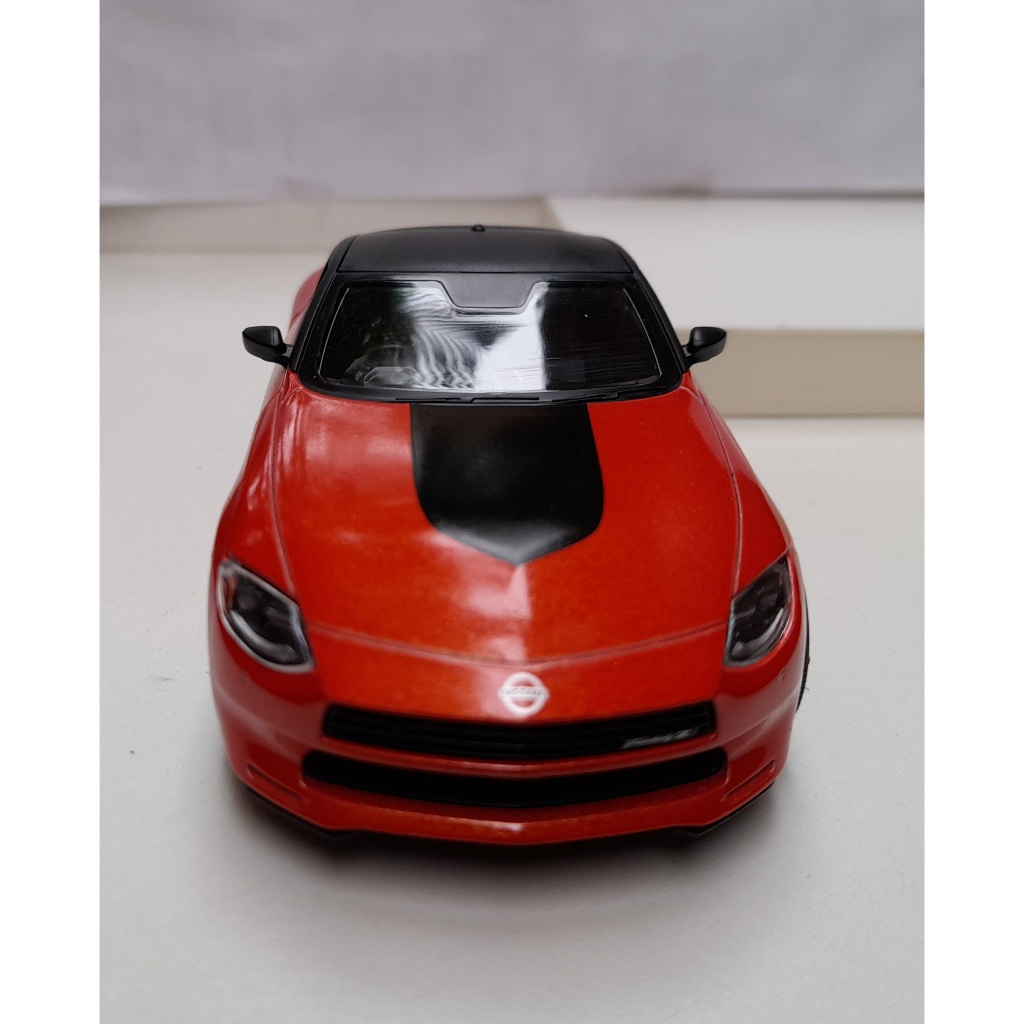 Miniatura Nissan Fairlady Z Customized Cobre 2023 Kinsmart 1/36 Metal e Fricção