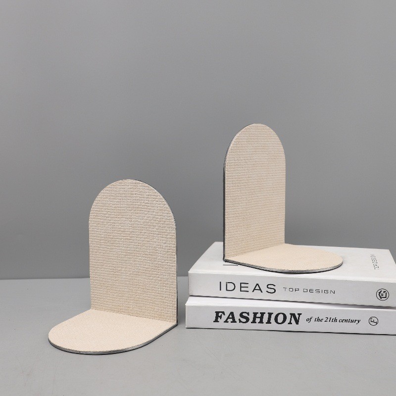 Modern minimalist geometric metal and leather bookends and decorative pieces for study, entryway, bedroom, and model hom