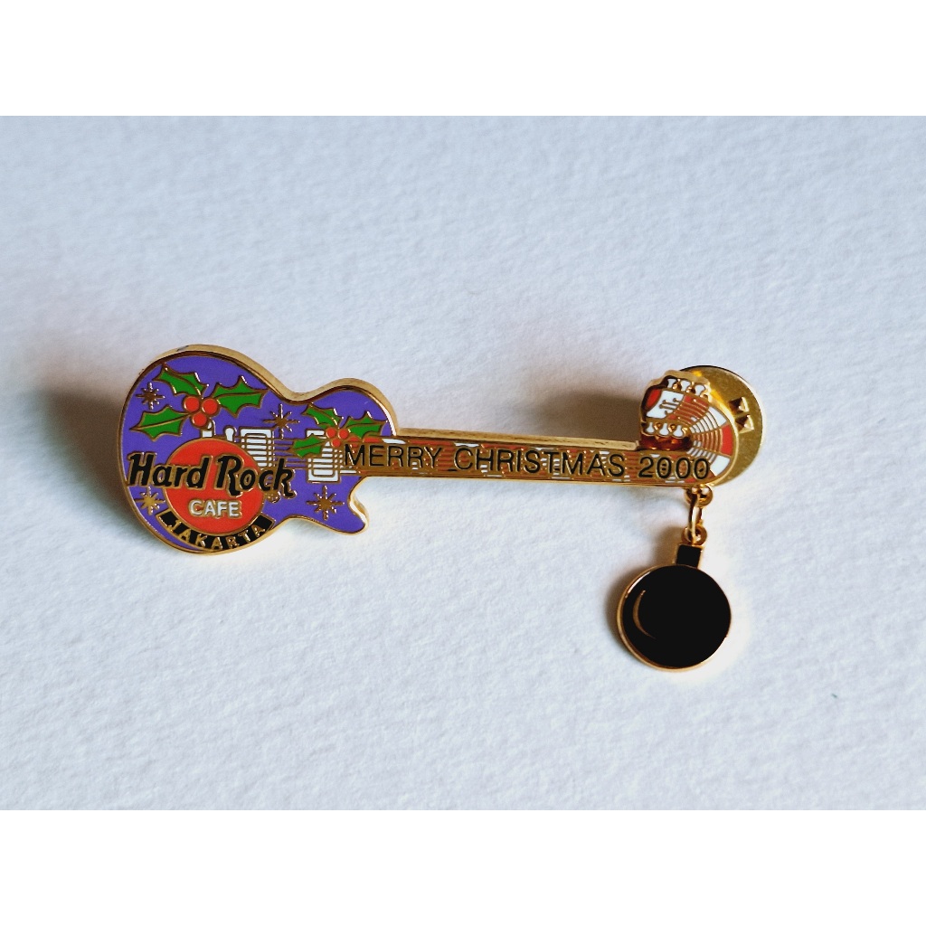 Pin / Broche - Hard Rock Cafe - Jakarta, Indonesia - Merry Christmas 2000 Purple Guitar with Hanging Ball