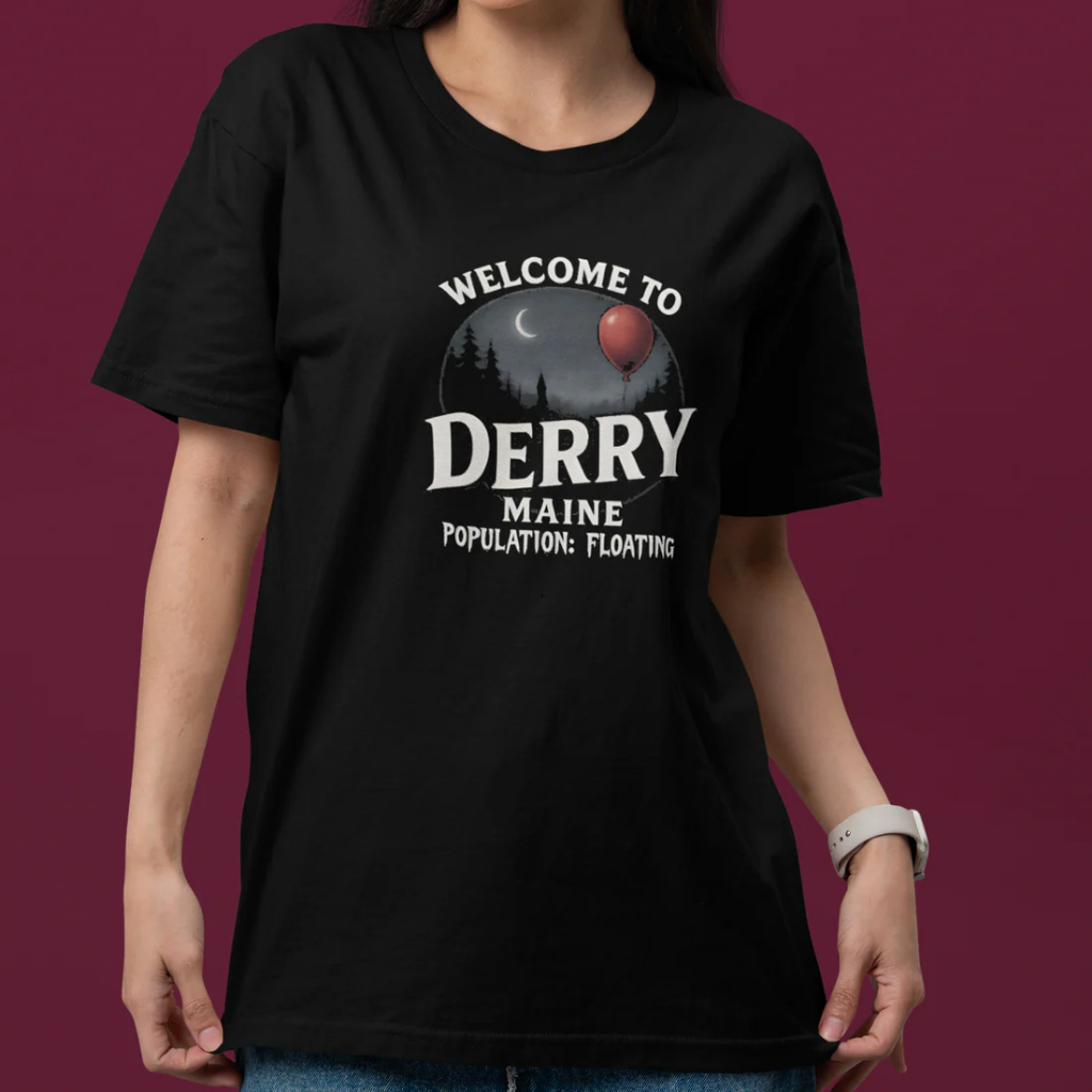 Camiseta Unissex IT: Bem vindos a Derry Population: Floating Camisa 100% Algodão