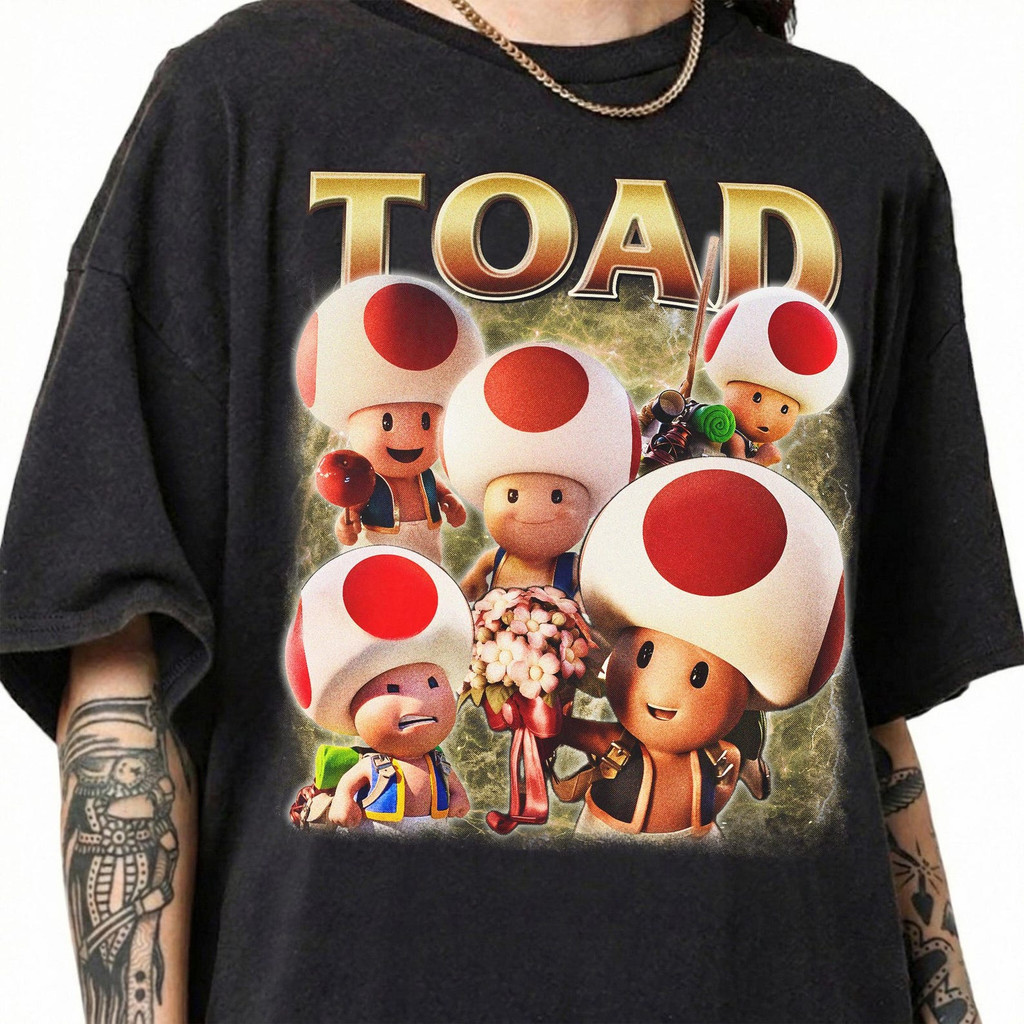 Atelier das Estampas Camiseta Feminina Toad Super Mario Cores Vibrantes Fofa Estilosa Ilustração Retro