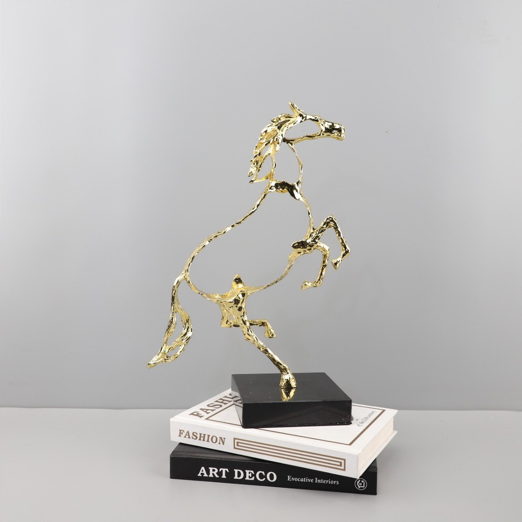 Modern minimalist abstract metal hollowed-out horse sculpture ornament for living room, entryway, study, and home decor