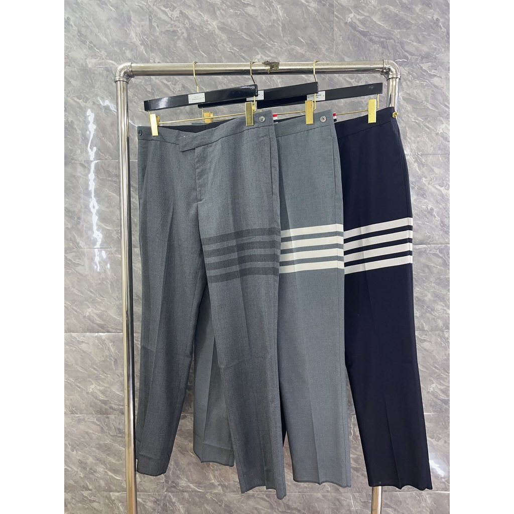 3WI0 2026New  New style of men's and women's trousers, featuring a four-stripe woven design, offering a sophisticated an