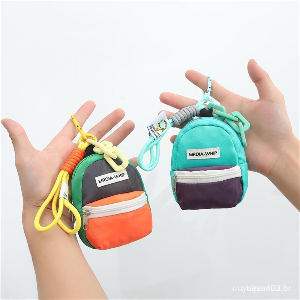 1 Mini Mochila Chaveiro Pequena Bolsa Porta-Moedas Carteira com Zíper Cor Macaron Unissex Airpods Cosméticos